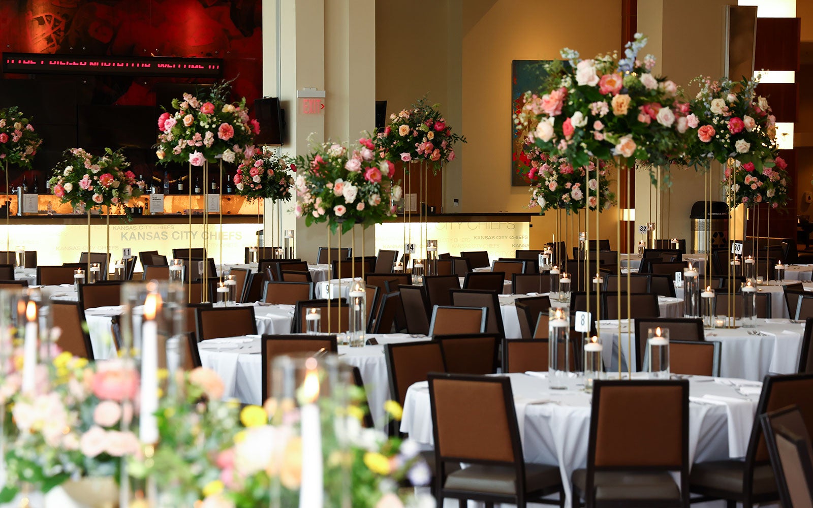 View of a wedding reception setup in the Club Level of GEHA Field at Arrowhead Stadium